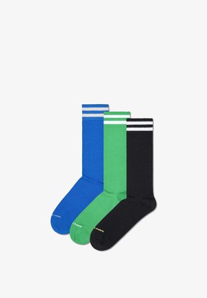 Three pairs of athletic socks: one blue, one green with white stripes, and one black. Each has a ribbed texture and a solid color design.