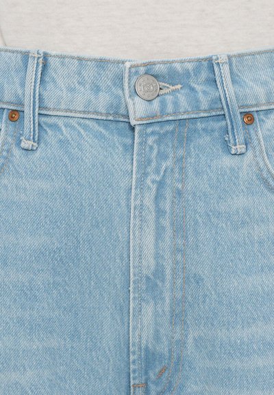 Light blue denim jeans with a high waist, featuring a metal button closure, copper rivets, and contrast stitching along the seams.