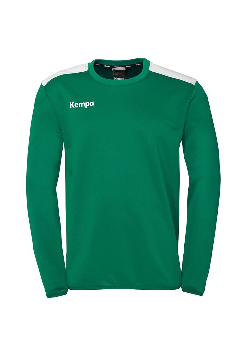 Groene sportshirt met lange mouwen en witte schouderaccenten. Heeft een ronde halslijn en het "Kempa" logo in het wit op de borst.