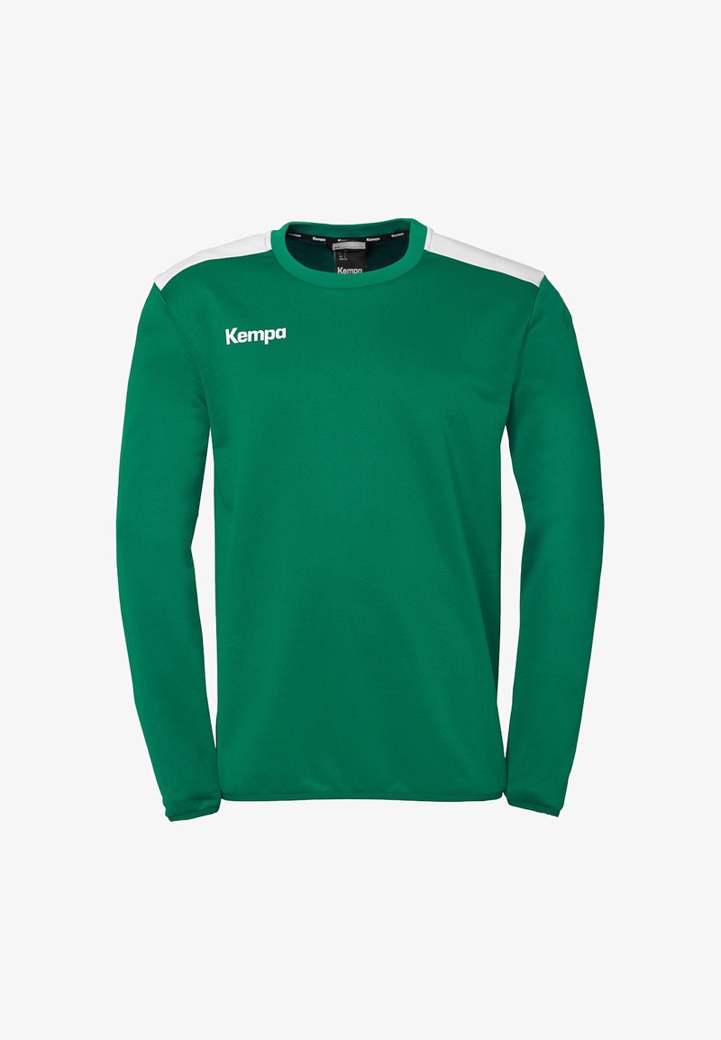 Groene sportshirt met lange mouwen en witte schouderaccenten. Heeft een ronde halslijn en het "Kempa" logo in het wit op de borst.