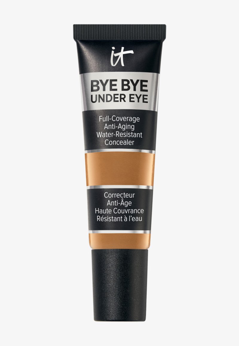 IT Bye Bye Under Eye correcteur anti-âge couvrance totale, résistant à l'eau, dans un tube beige avec des accents noirs et argentés.