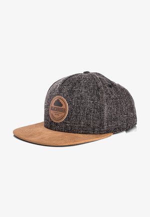 Black cap with a textured dark gray fabric body and a flat brown suede brim. Features a brown circular logo patch on the front.