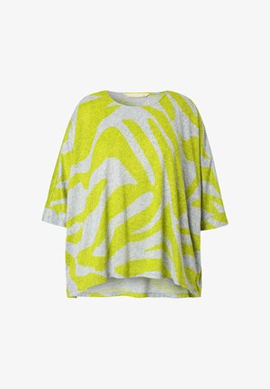 Harmaa ylisuurikokoinen t-paita, jossa on eloisa keltainen seeprahaihtuma. Pehmeä rakenne ja lyhyet hihat sekä pyöreä kaula-aukko.
