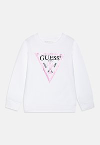 Felpa bianca con un logo a triangolo rosa che riporta il testo "GUESS" e "U.S.A.", texture morbida, colletto a girocollo e polsini a costine.