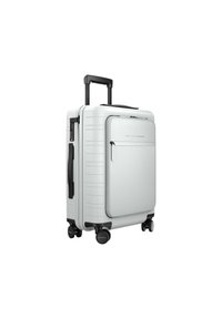 Hard-shell suitcase in light gray with a textured surface, retractable handle, and multi-directional wheels. Features a front zip pocket.