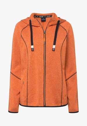 Giacca in pile arancione con zip frontale, accenti neri a contrasto, cappuccio con cordoncino e tasche laterali. Tessuto strutturato con una finitura morbida.