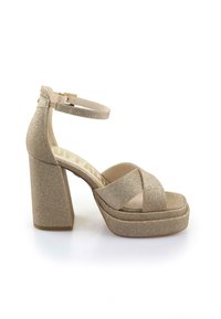 Buffalo Sandali z visoko peto - gold