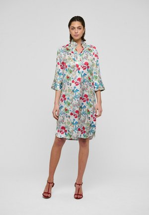 Blumenkleid aus seidenartigem Stoff, mit Kragen, Dreiviertelärmeln und lebendigen Farben wie Rot, Blau und Grün.