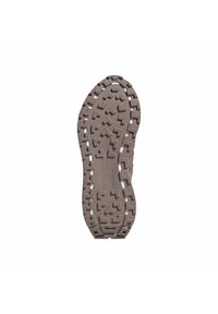 Brun gummisula med texturerade mönster, inklusive zigzag- och vinkelformer; förstärkta kanter; lättviktig design för grepp.