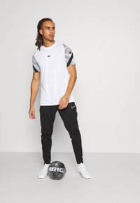 Nike Performance ACADEMY PANT - Trainingsbroek - black/white