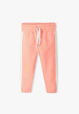 Pink sweatpants with a soft texture, elastic waistband, adjustable white drawstring, and white side stripes. Fitted at the ankle.