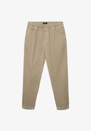 Pantaloni in corduroy beige con vestibilità rilassata, caratterizzati da una gamba affusolata, una vita elastica e una sottile trama a coste.