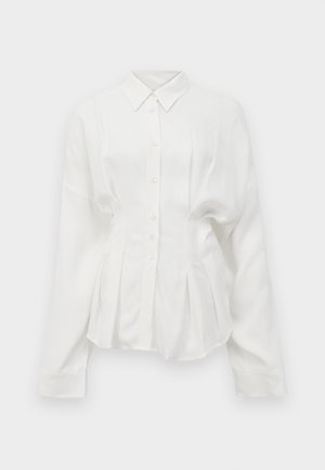 White long-sleeve shirt, features a pointed collar, button front, and pleated design. Made from a smooth fabric with a slight sheen.