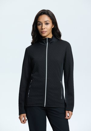 Zwarte zip-up jas van textuurstof, hoge kraag en twee zijzakken. Voorzien van een contrasterende witte rits en een getailleerd ontwerp.