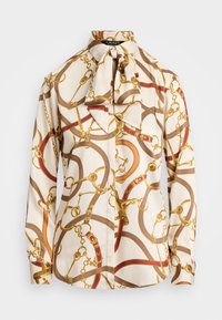 Ilgi piedurkņu blūze no viegla auduma, ar krēmkrāsas fona, uz kura ir zelta un bordo ķēdes raksts un saitēta apkakles loka detaļa.