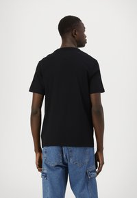 Tommy Hilfiger STACK - Print T-shirt - black