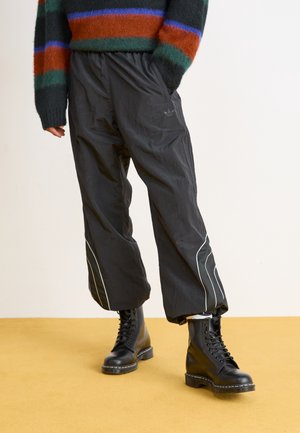 adidas Originals STONE - Pantalon de survêtement - black