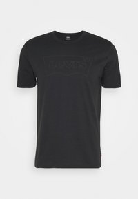 Černé krátké rukávy tričko s kulatým výstřihem od značky Levi's, s jemným tonálním logem na hrudi a malou červenou nášivkou na bočním švu.