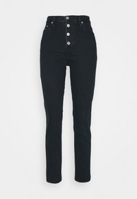 High-waisted black denim jeans feature a straight leg, five-button fly, and front and back pockets. Smooth texture with minimal detailing.