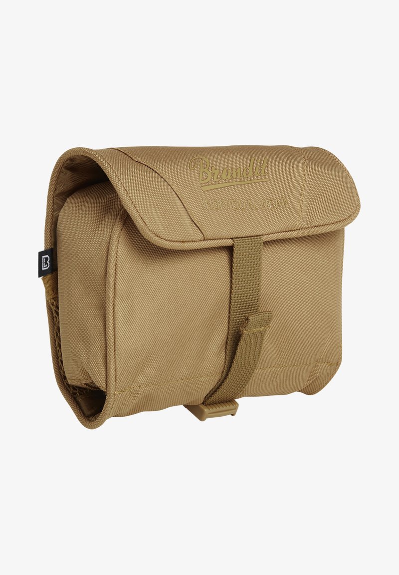 Beige auduma glabāšanas soma ar vāku, ar teksturētu virsmu, priekšējo siksnu un uzspiesta logo detaļu uz vāka.