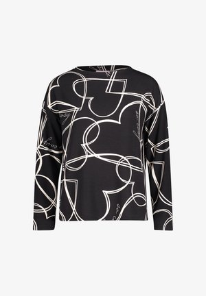 Zwart shirt met lange mouwen met een wit abstract hart- en lijnpatroon. Het materiaal lijkt glad en heeft een ontspannen pasvorm. Rondhals ontwerp.