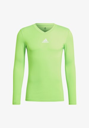 T-shirt de sport Adidas vert citron à manches longues avec col en V et logo blanc Adidas centré sur la poitrine.
