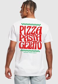 White cotton t-shirt featuring bold red text: "PIZZA PASTA GELATO" with green checkerboard accents. Back design includes "SERVED FRESH DAILY."