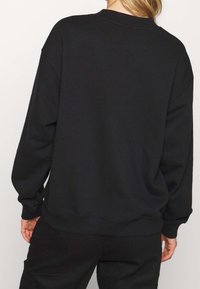 Monki Felpa - black