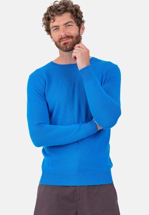 Pull bleu vif, tricoté, col rond, manches longues, poignets et ourlet à côtes. Texture lisse sans motifs ni accents visibles.