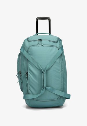 Große türkisfarbene Stoff-Duffle-Tasche mit einem ausziehbaren Griff, mehrerenReißverschlusstaschen und Umhängegurten. Strukturiertes Material mit gestickten Akzenten.
