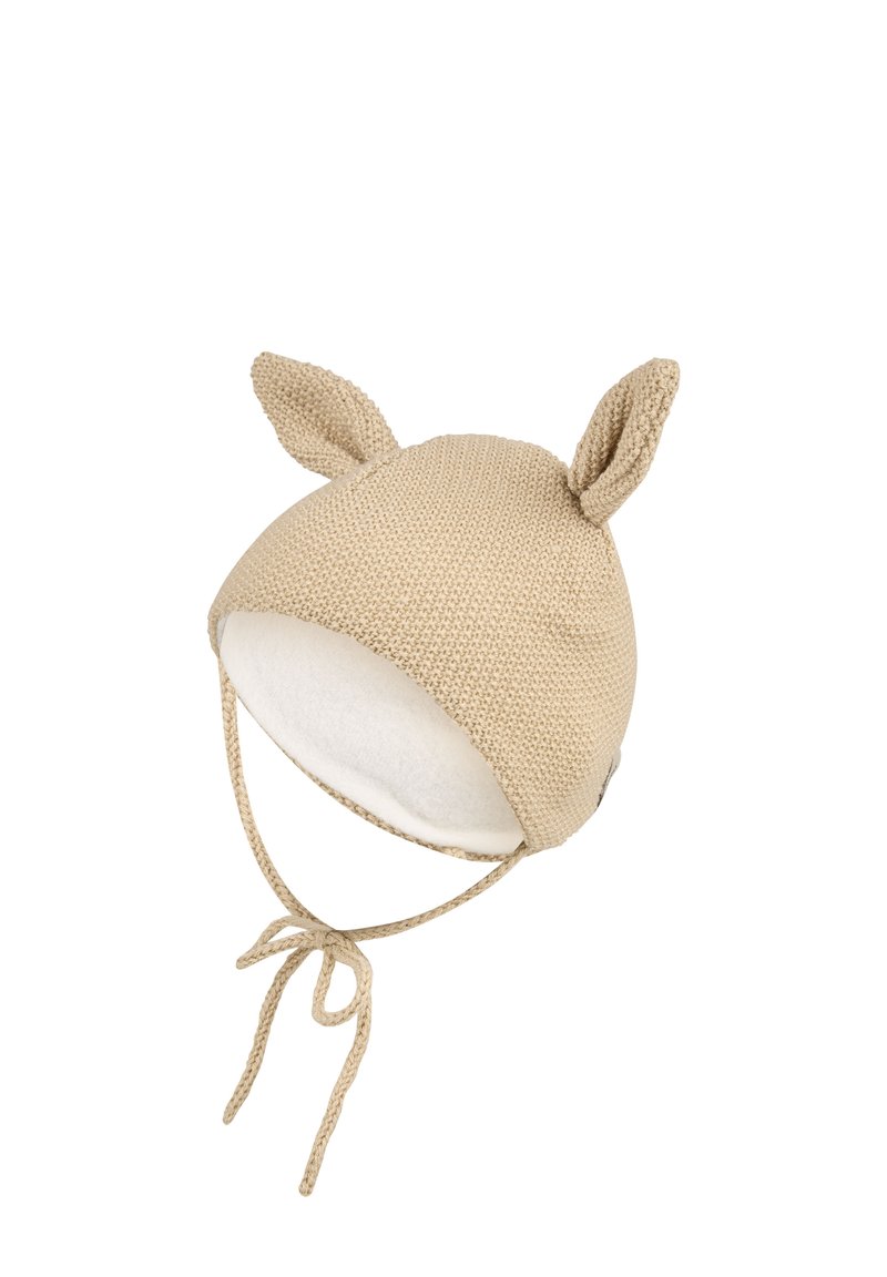Beige knitted baby hat with two small ears on top and chin ties, lined with soft white fabric inside.