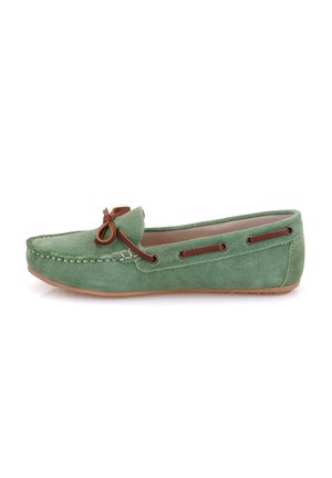 Green suede loafers with a brown leather accent, featuring a bow detail, stitched edges, and a flat rubber sole.