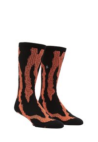 Chaussettes noires avec un motif abstrait orange présentant des lignes ondulées. Fabriquées en matériau extensible, conçues pour le confort et la durabilité.