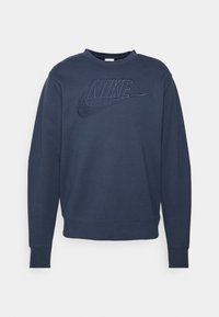 Mörkblå långärmad crewneck sweatshirt med Nike-logotypen broderad i matchande blått på bröstet.