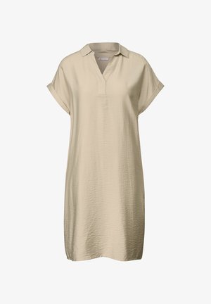 Abito corto beige con colletto e scollatura a V. Presenta maniche corte arrotolate e una texture morbida, che arriva appena sopra il ginocchio.