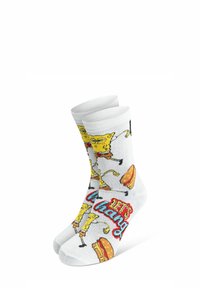 Calzini bianchi da crew con grafiche di cartoni animati colorate di un personaggio e di cibi, con la scritta "LET'S CHANG" in grassetto rosso.