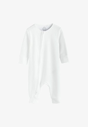 Un body en coton blanc pour bébé avec des manches longues, une texture côtelée, un col arrondi et une fermeture éclair à l'avant. Les poignets et les chevilles sont élastiqués.