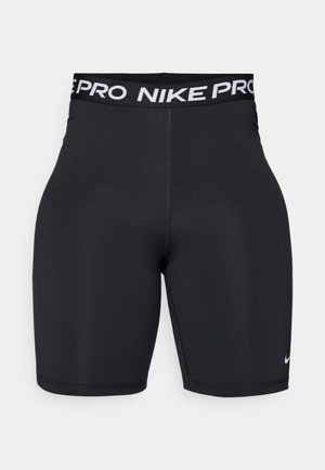 Zwarte sportshorts gemaakt van rekbare stof met een brede zwarte tailleband waarop "NIKE PRO" in het wit staat. Gladde textuur, lengte boven de knie.
