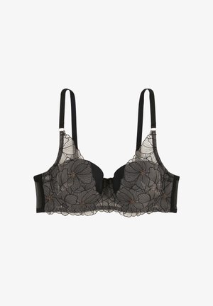 Soutien-gorge en dentelle noire avec broderie florale et bonnets transparents. Comprend des bretelles réglables et une fermeture à agrafes. Des accents floraux ajoutent du détail.