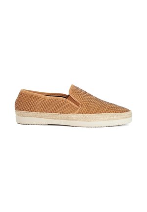 Slip-on casual shoe with light brown woven upper, white rubber sole, and jute trim detail around the sole edge, side view on white background.
