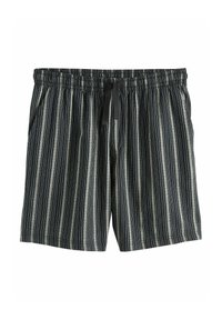 Schwarz-weiße gestreifte Shorts mit einem elastischen Bund, ausgestattet mit einer Kordelzugdetail und einem leichten Stoff.