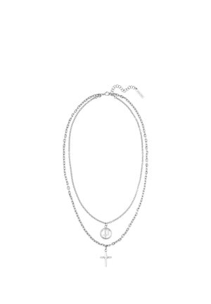 Double-layer silver chain necklace with round pendant on shorter chain and cross pendant on longer chain.
