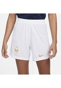 Shorts de sport blancs avec une taille élastique, arborant un logo Nike doré et un emblème de coq doré brodé. Texture lisse, coupe décontractée.