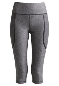 Szare legginsy sportowe o dopasowanym kroju, wykonane z teksturowanej tkaniny. Posiadają czarne akcenty i logo w okolicy dolnej części nogi.