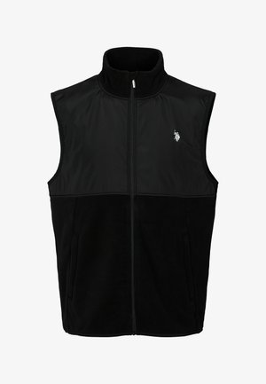 Čierna vesta so zipsom vpredu, vyrobená z mäkkého fleece a hladkej textílie. Obsahuje vysoký golier a malý logotyp na hrudi.