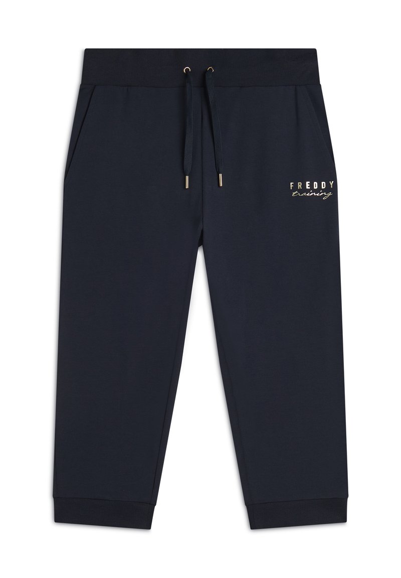 Pantalones de chándal azul marino hechos de una tela suave, con cinturilla elástica y cordón, bolsillos laterales y el logo dorado "Freddy Training".