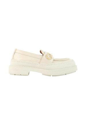 Off-white læderloafer med chunky sål, bølgede kantdetaljer og gyldent dekorativt spænde på remmen øverst.