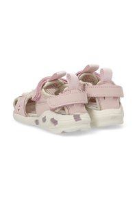 Sandalias rosas con un diseño de malla transpirable, correas ajustables y una suela de goma con patrón. Acabado texturizado con una construcción ligera.