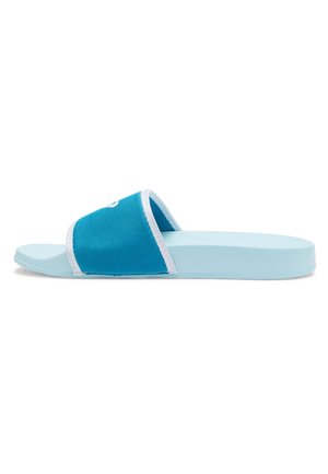 Blue slide sandal with a canvas upper, white trim, and a flat rubber sole. Features a simple design and open-toe construction.