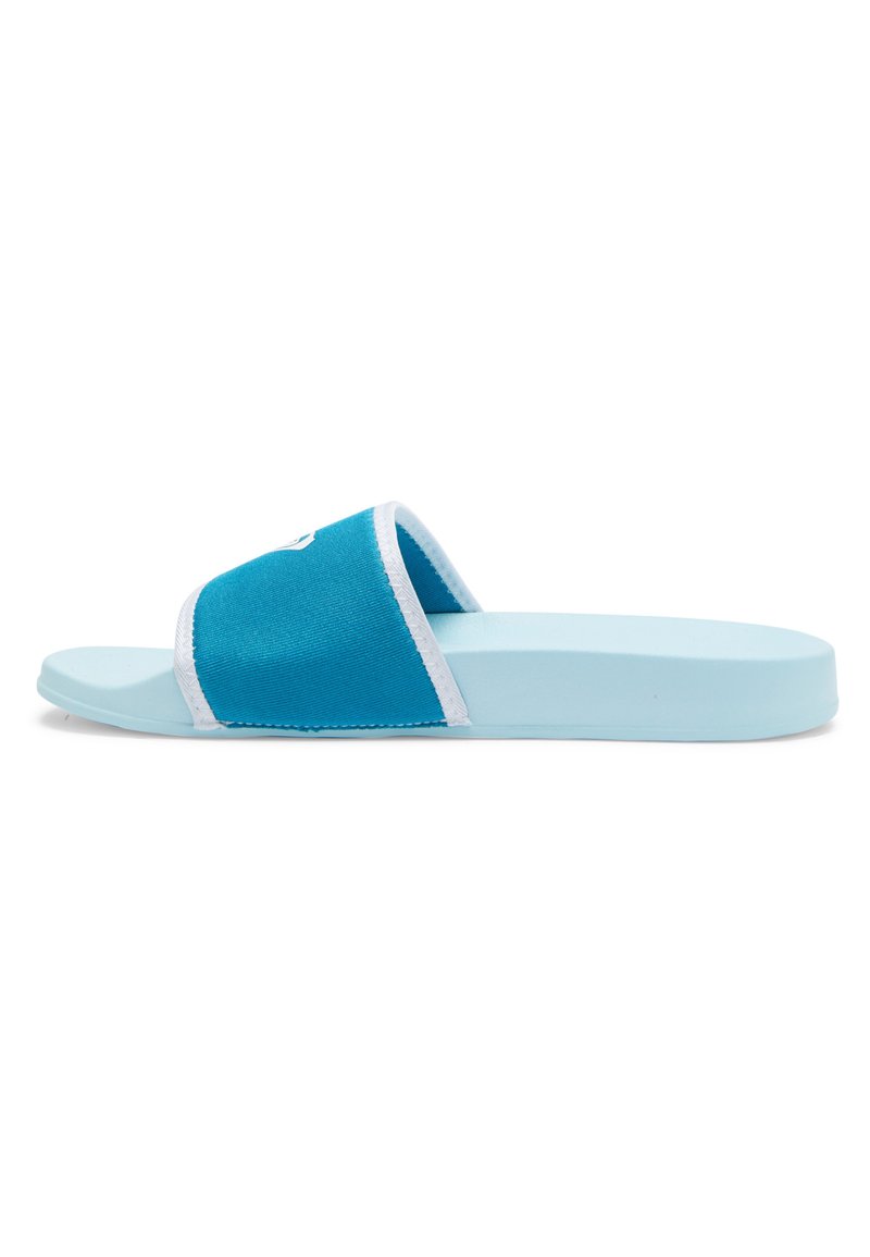 Blue slide sandal with a canvas upper, white trim, and a flat rubber sole. Features a simple design and open-toe construction.